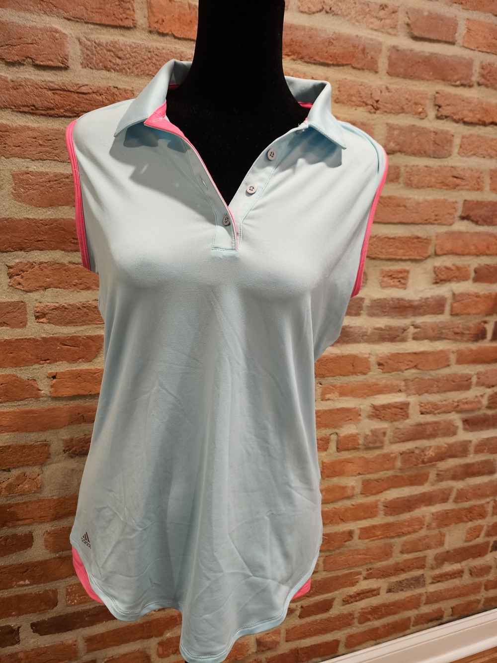 Light Blue Sleeveless Polo Top with Pink Trim